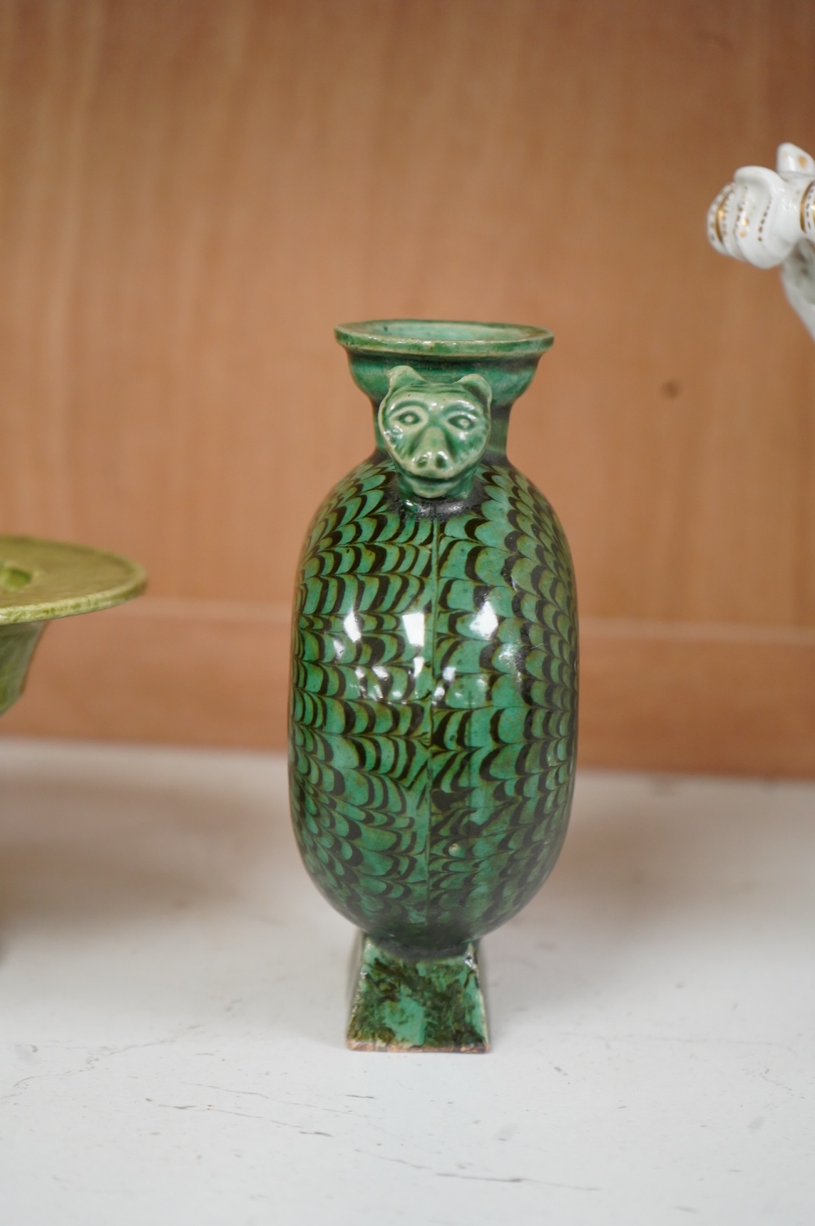 A Chinese agate ware flask, a sancai ewer and a stem dish, largest 26cm high